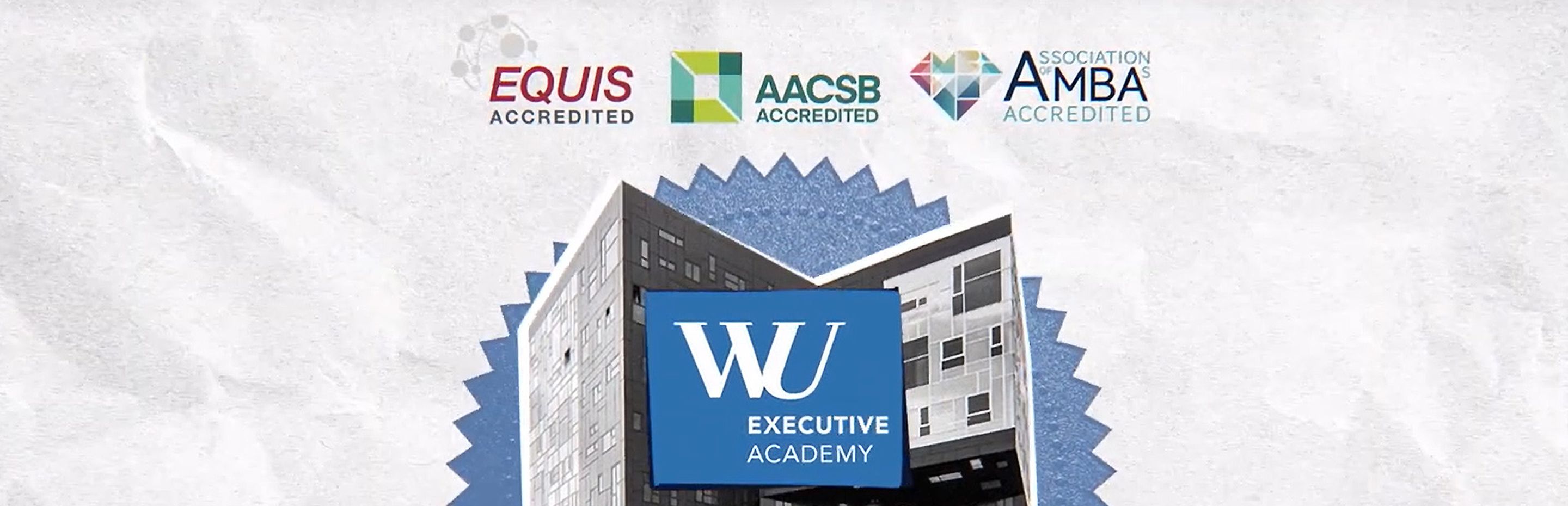 Image of WU Executive Academy building with logos for EQUIS, AACSB, and AMBA accreditations above it. - WU Executive Academy